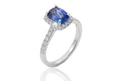 Blue Sapphire and Diamond Halo 18K White Gold Ring