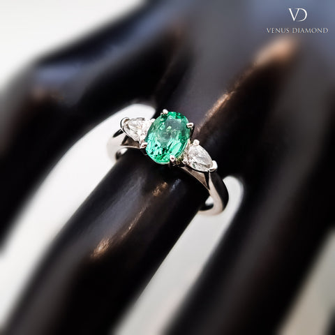 Platinum Pear Cut Diamond & Oval Emerald Trilogy Ring