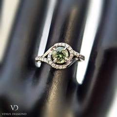 Platinum Diamond & Green Sapphire Halo Ring with a Twisted Shank